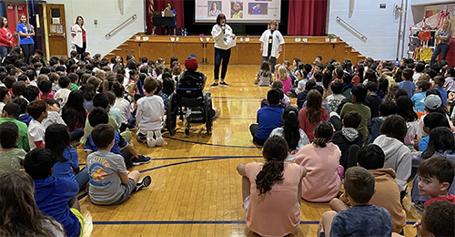 Students in the gym during a pep rally