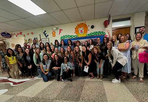 Staff members posing for a team picture