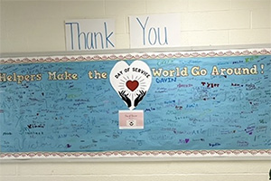 a wall with lots of thank you notes